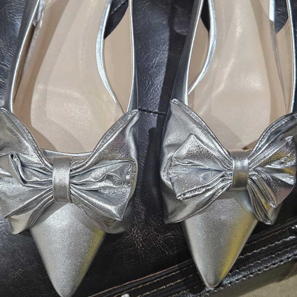 New leather silver bow flats from Anthropologie, size 9